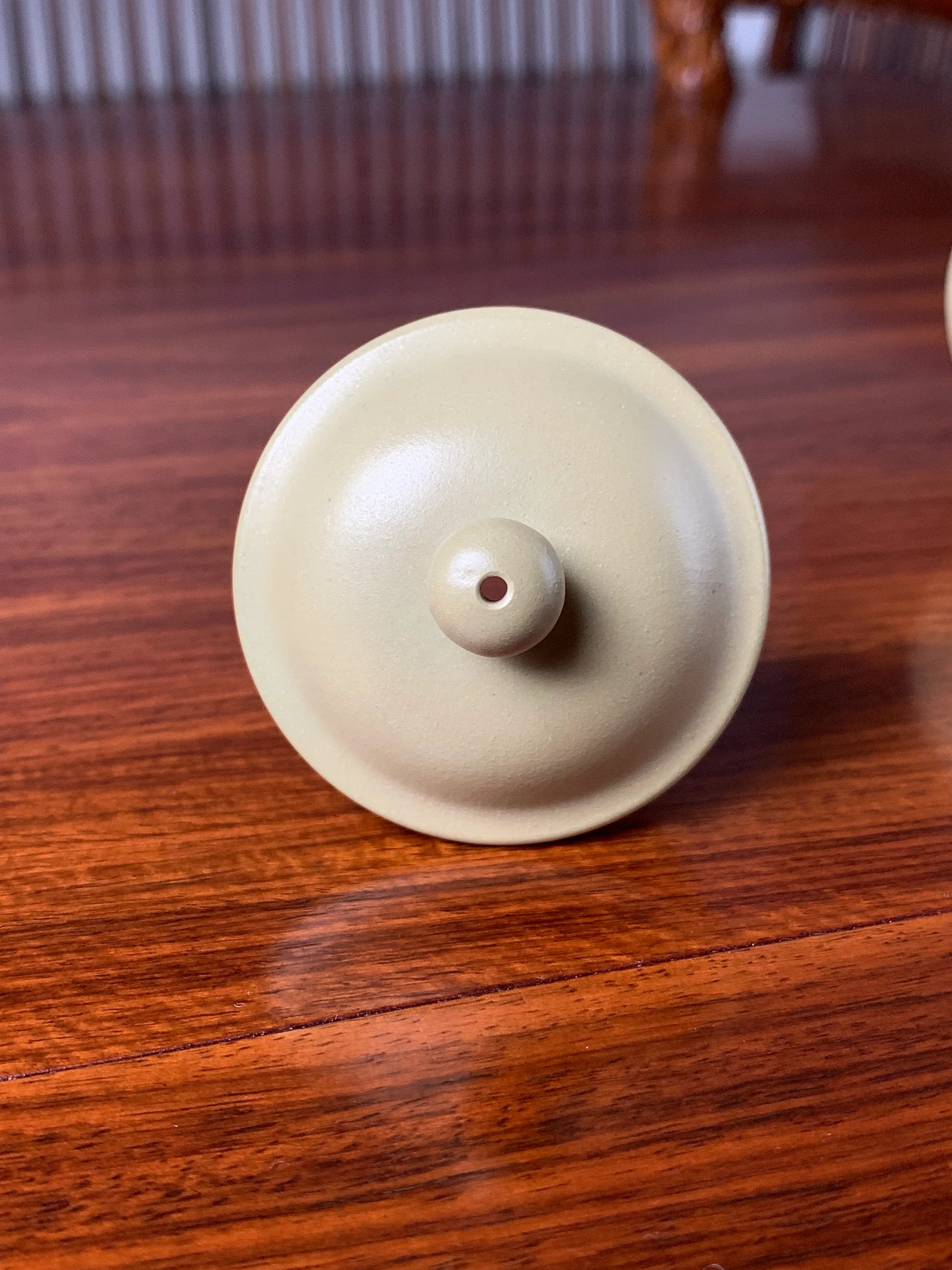 the lid of the teapot
