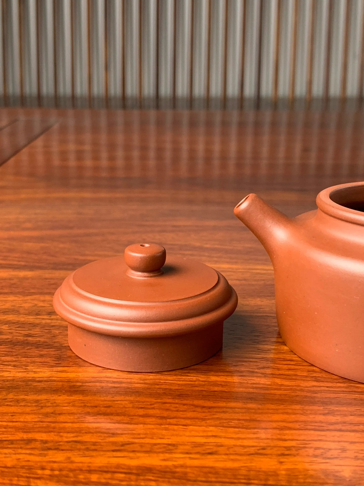 Details of the lid and spout of the collectible teapot