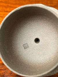 the lid mark of the teapot artist