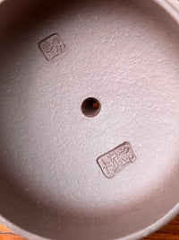 Artist's seals on the inside of the lid