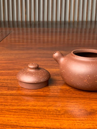 the lid and spout of the yixing zisha clay teapot you de