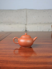 Back of shui ping teapot, designed for loose leaf tea