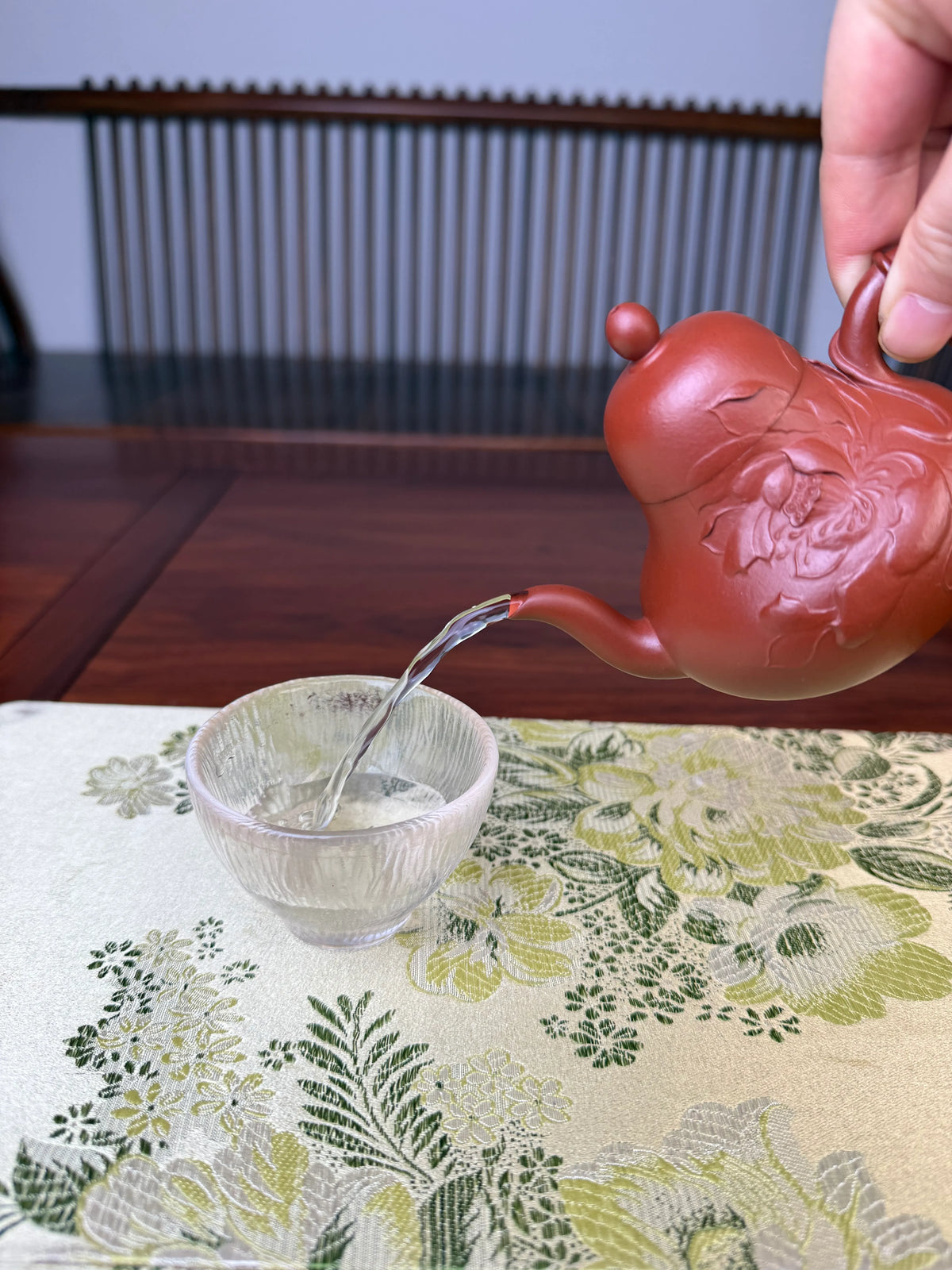 the perfect pour of the handmade zisha clay teapot named si ting