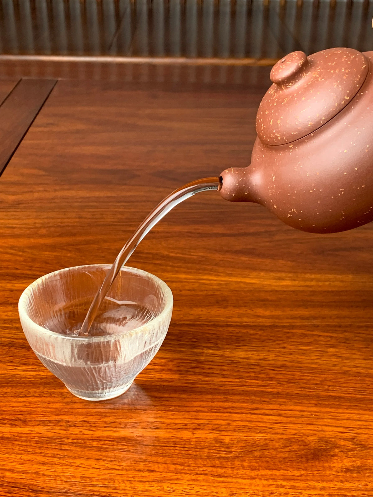 the perfect pour of the yixing zisha clay teapot named you de