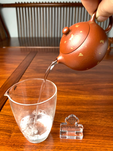 the pour of the xishi yixing teapot is perfect