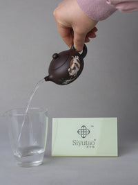 the perfect pour of the zisha teapot