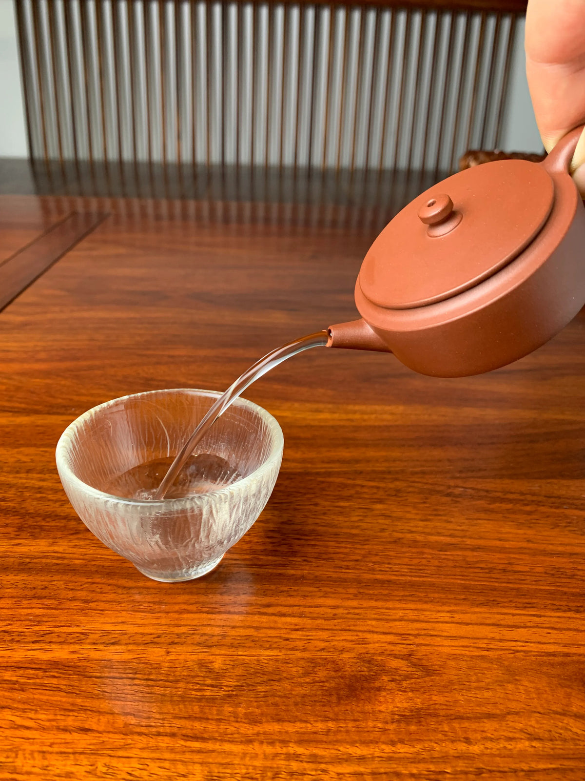 the perfect pour of the small yixing teapot han wa