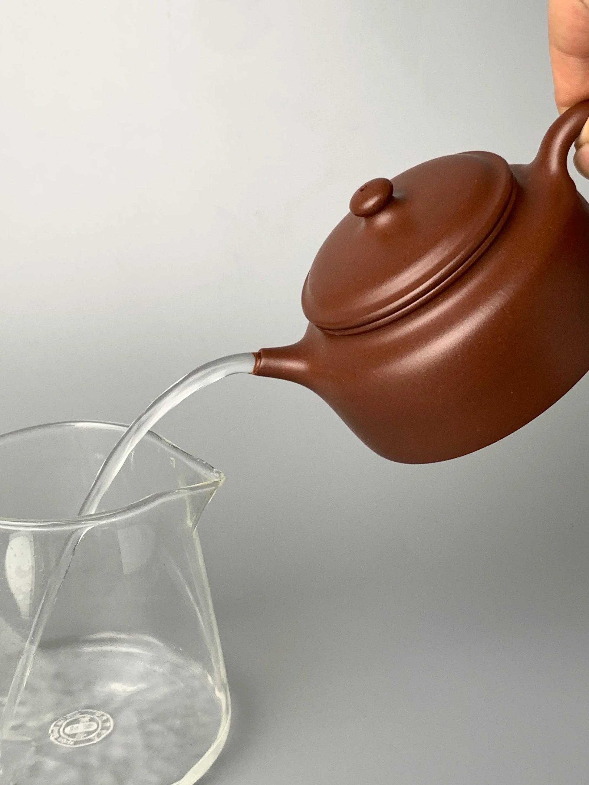 the pour of the chinese teapot yixing is excellent