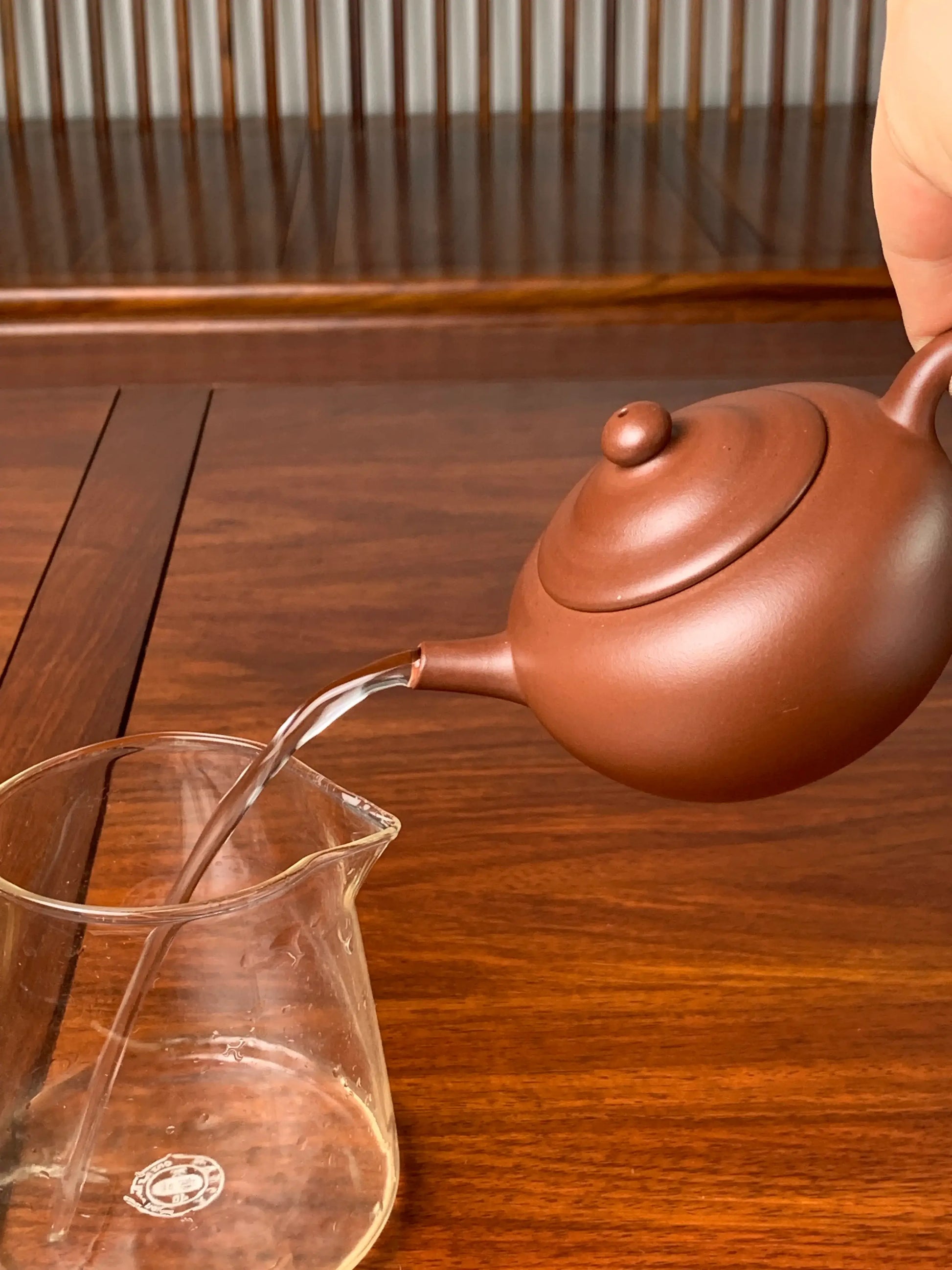 the pour of the yixing teapot shapes is excellent