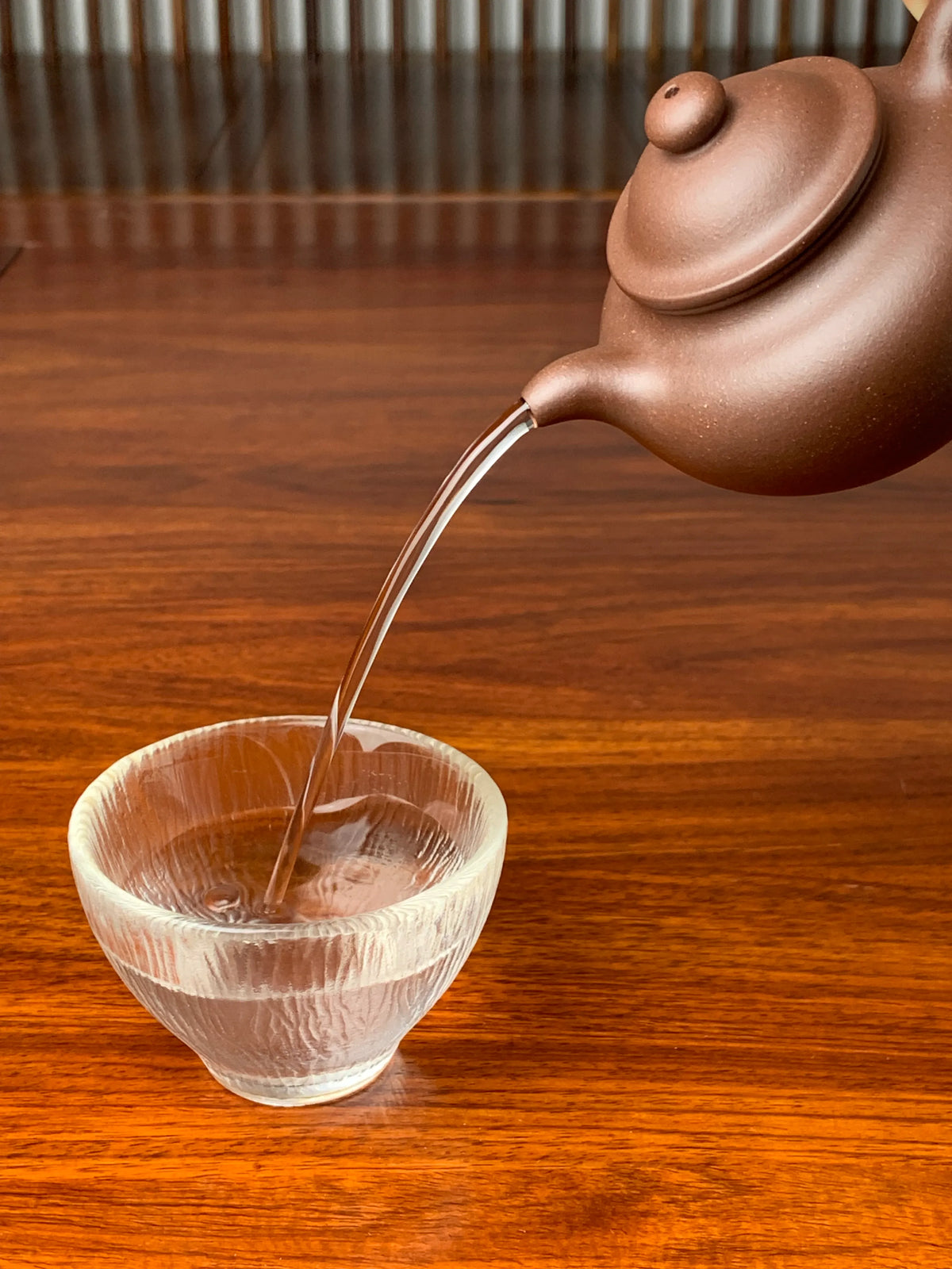 the pefect pour of the yixing zisha teapot lian zi