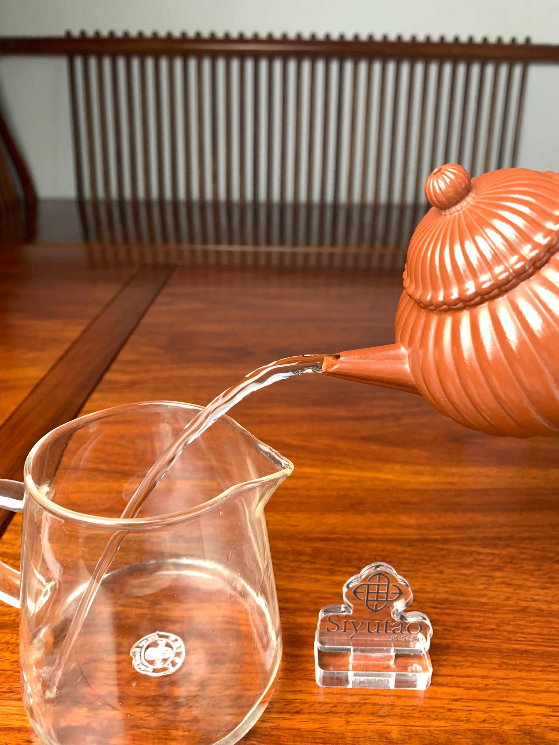 the pour of the handmade yixing teapot