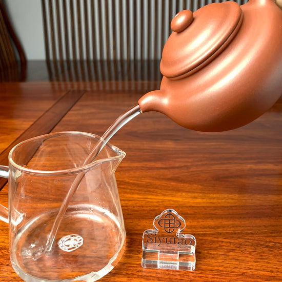 the pour of the handmade yixing teapot is excellent