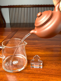 the pour of the handmade yixing teapot is excellent