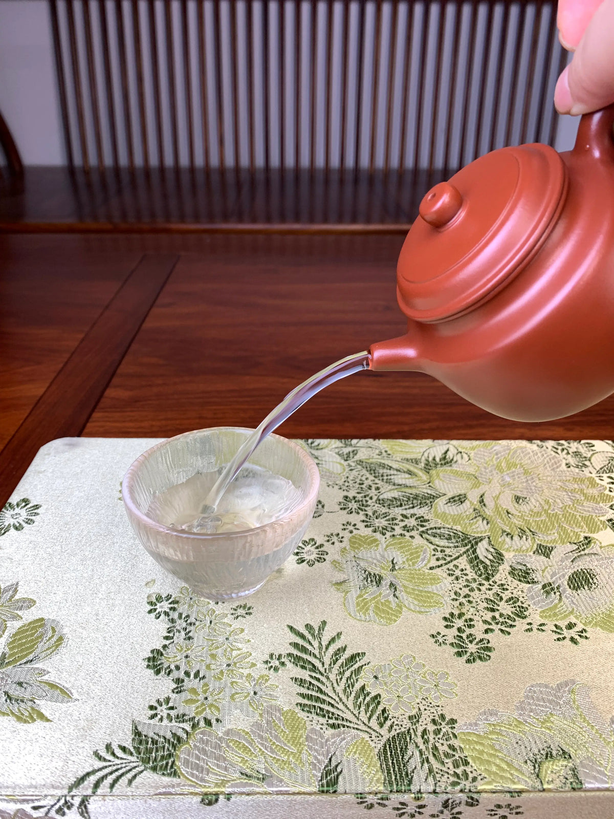the perfect pour of the handmade yixing teapot de zhong