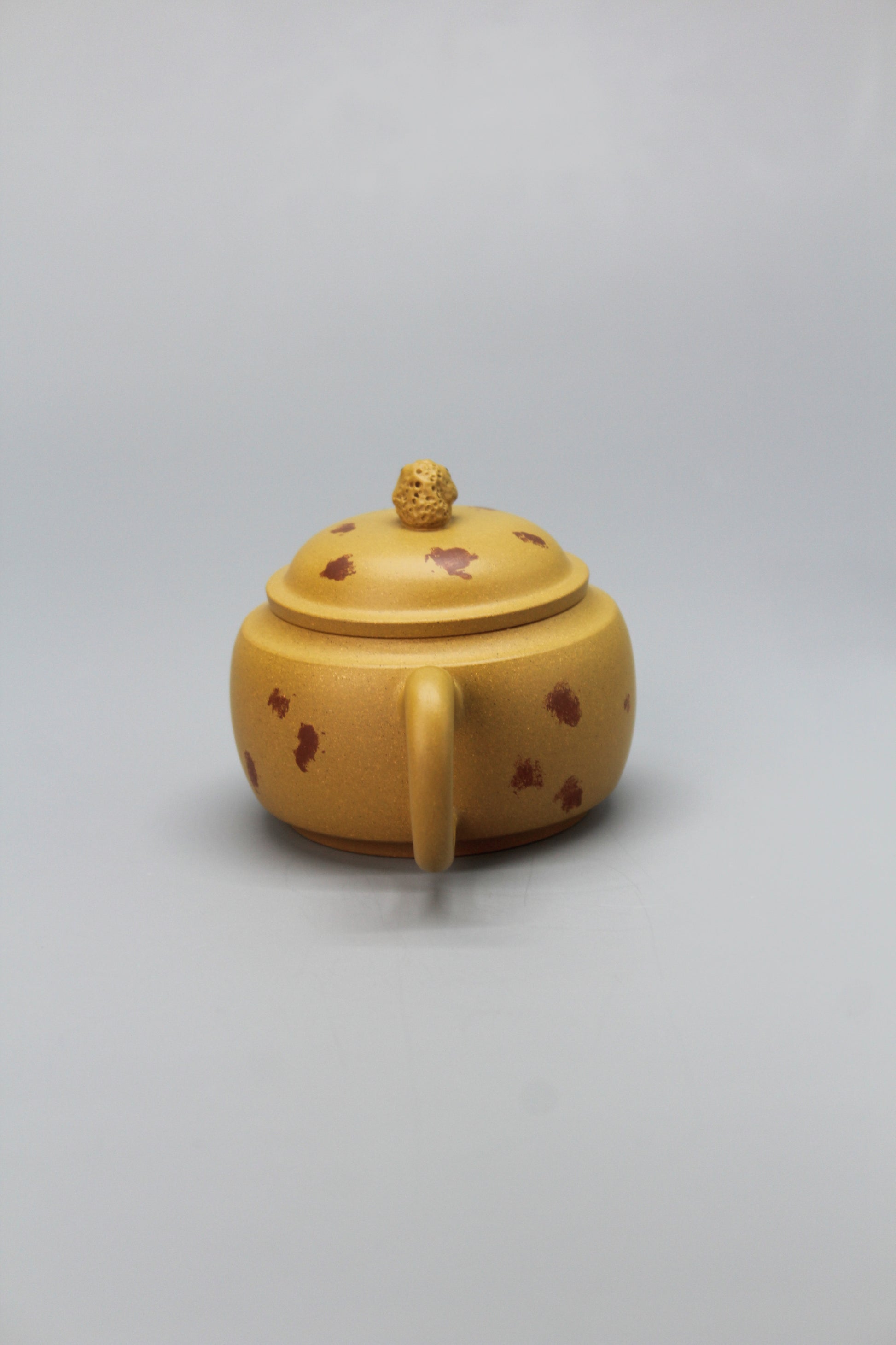 A cute small teapot for one handle