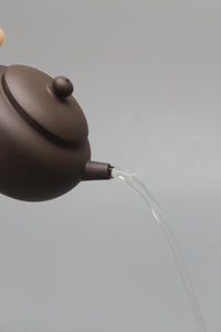 Small teapot handmade pour