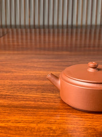 the spout of the small yixing teapot