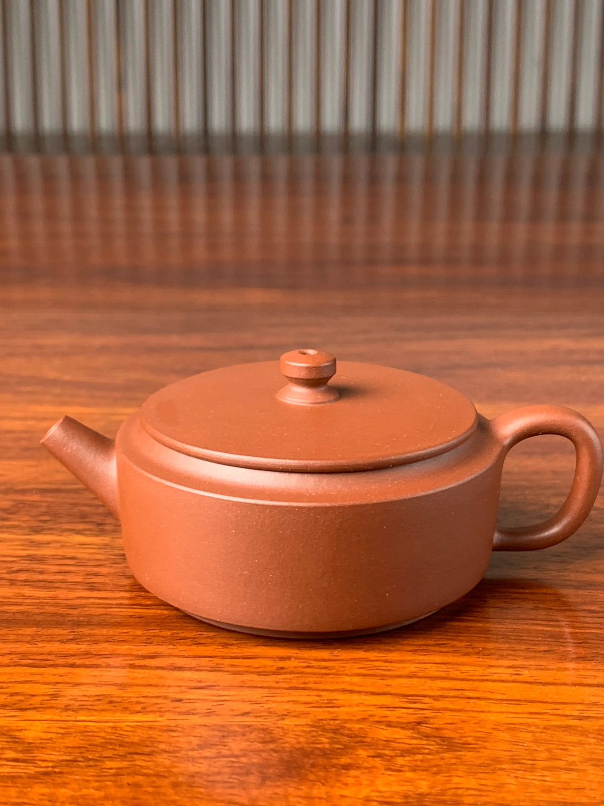 the small yixing teapot named han wa on the table