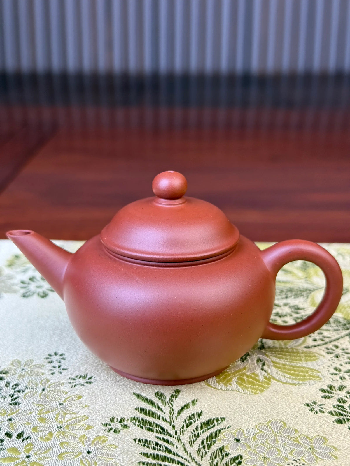 front view of small yixing teapot shui ping designed for one person gongfutea 