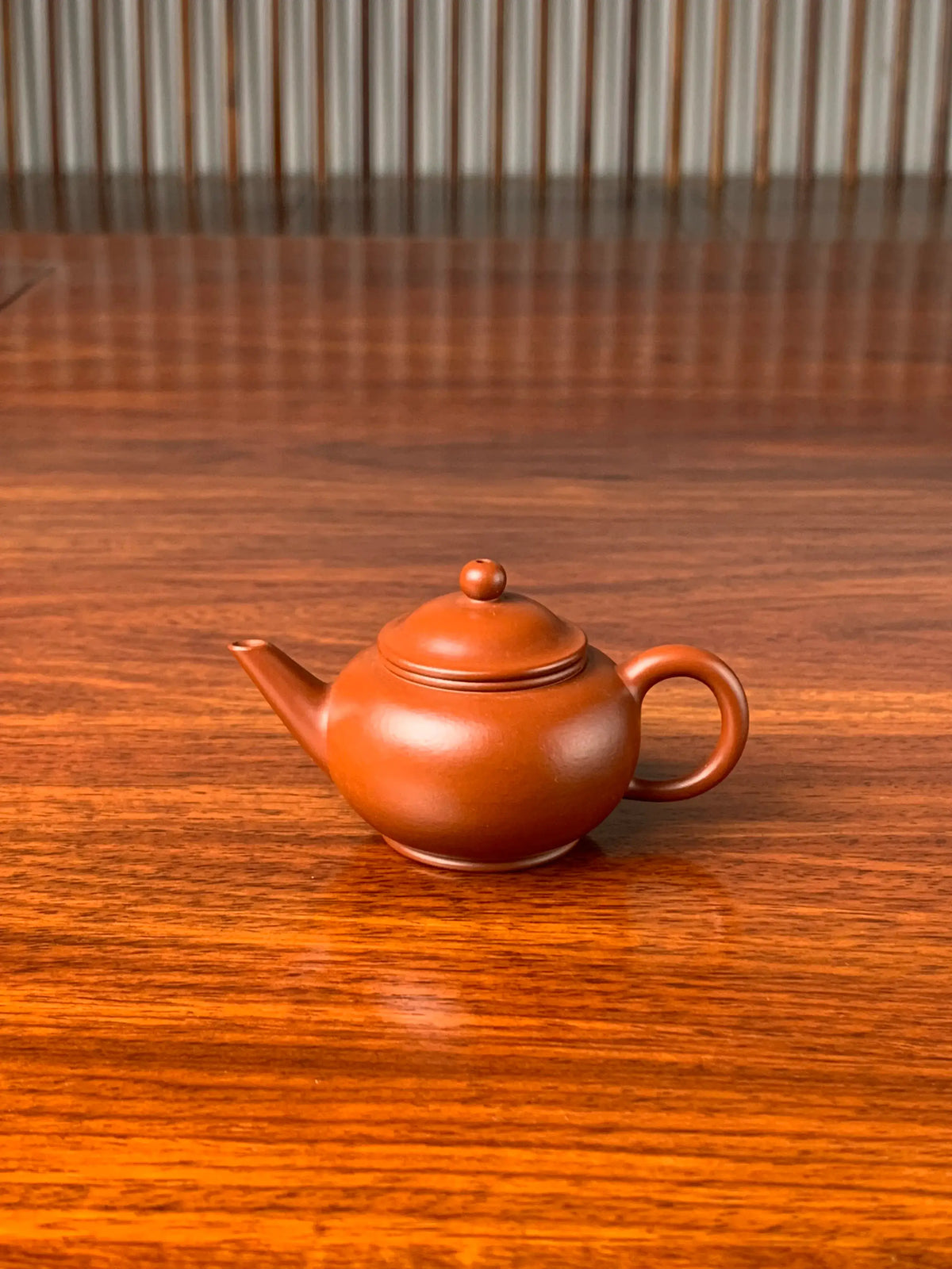 A close-up look at the small Yixing Shui ping teapot