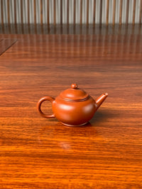 the back view of the small yixing teapot shui ping