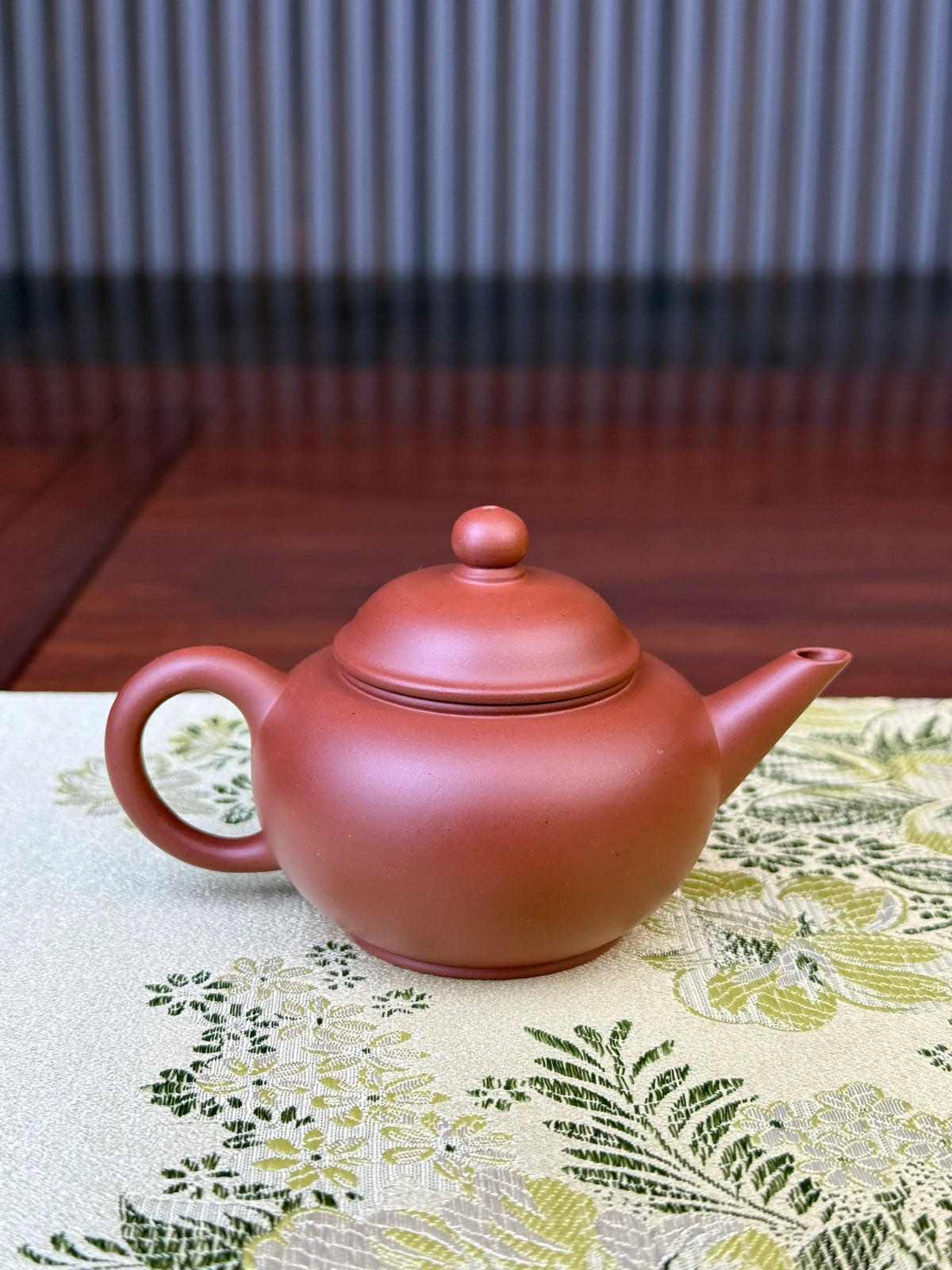 back view of small yixing teapot shui ping designed for one person gongfutea 