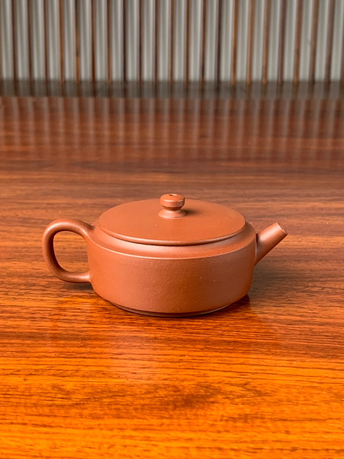 the back view of the small yixing teapot han wa