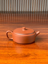the back view of the small yixing teapot han wa