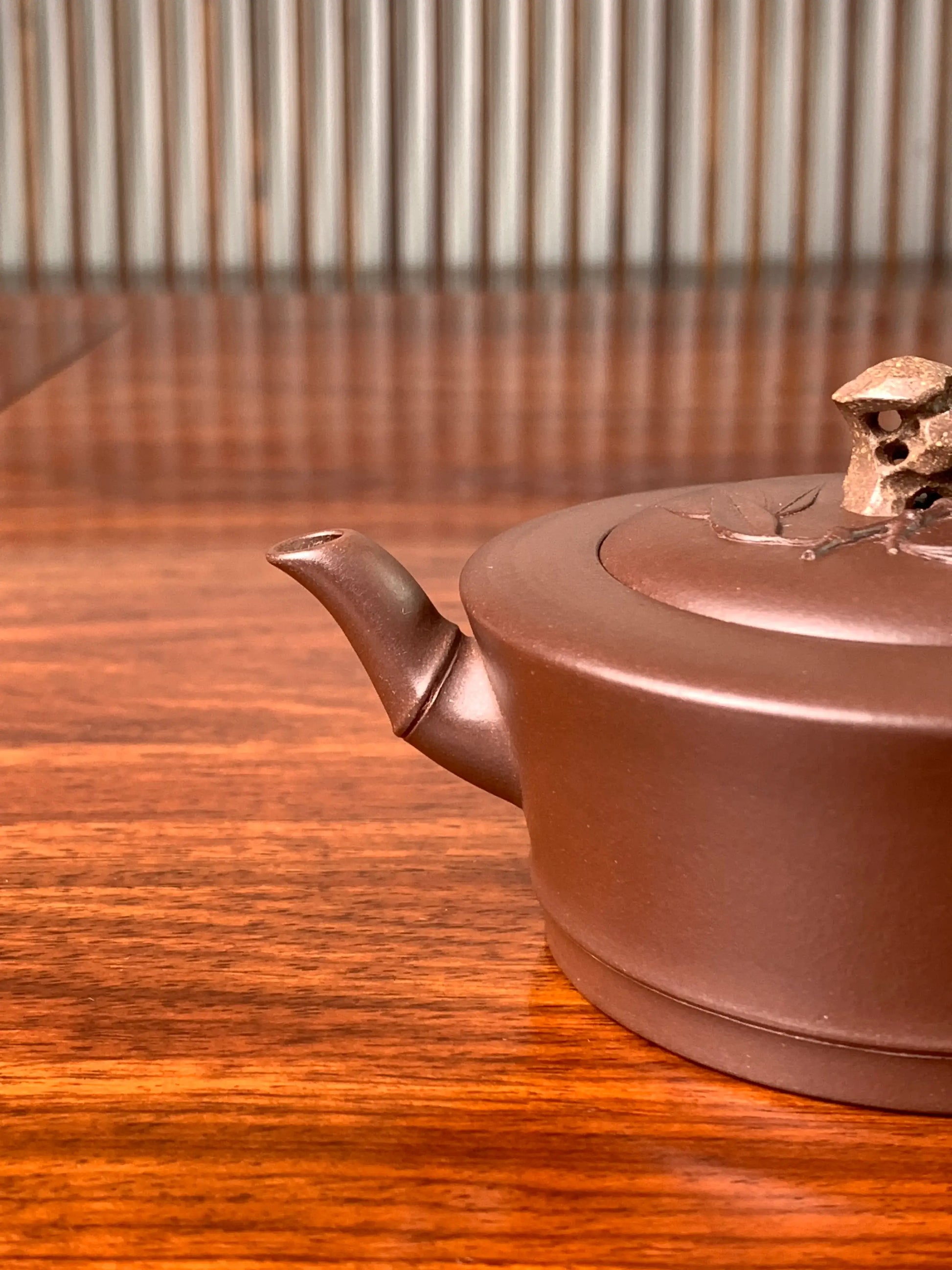 Front view showing the details of the collectible teapot spout