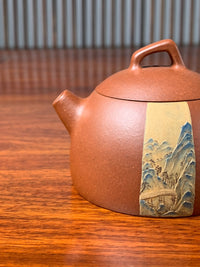 the spout of the teapot artwork on the table