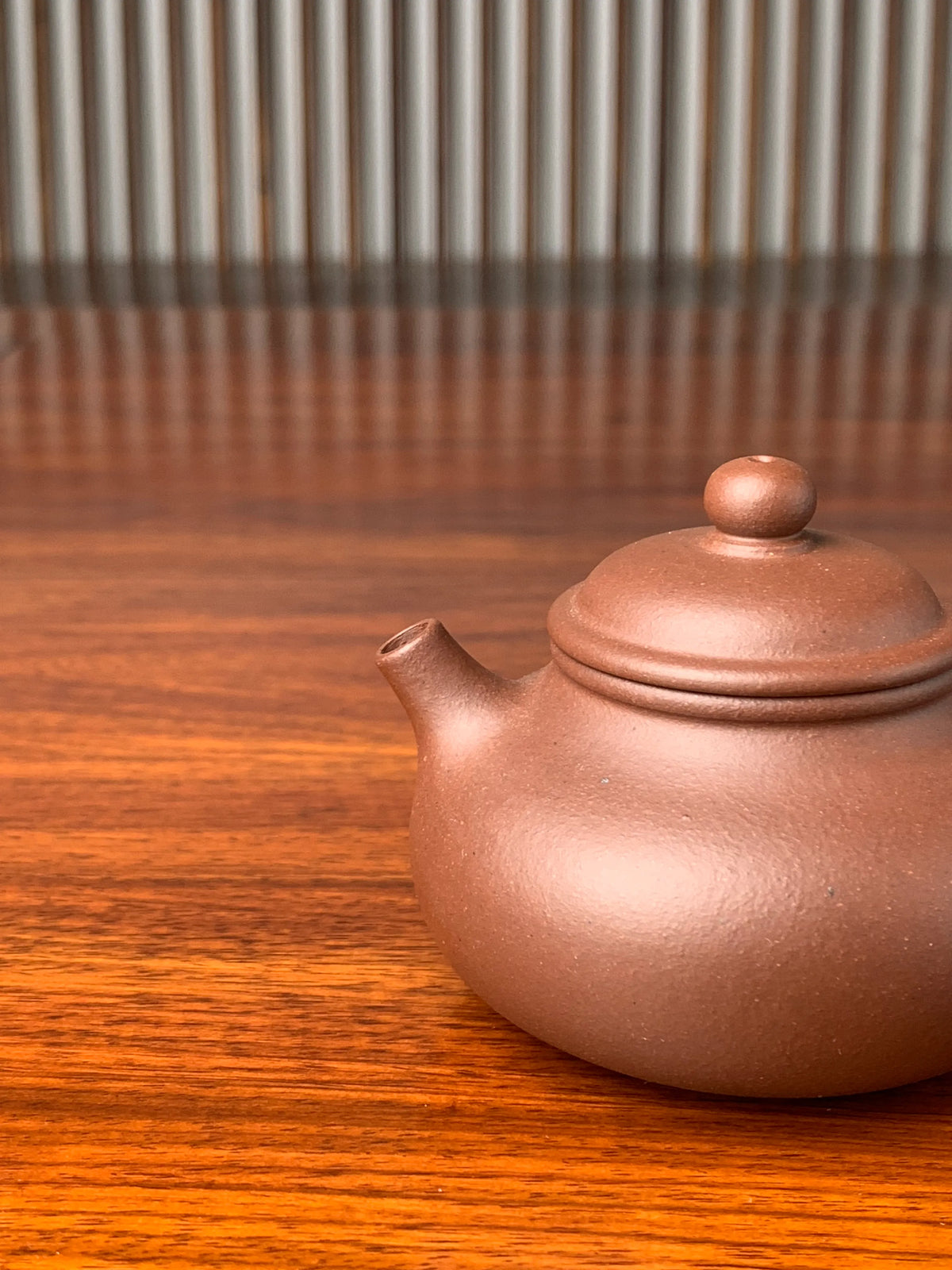 the spout of the yixing zisha clay teapot rong tian