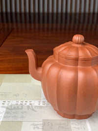 the spout of this yixing teapot handmade