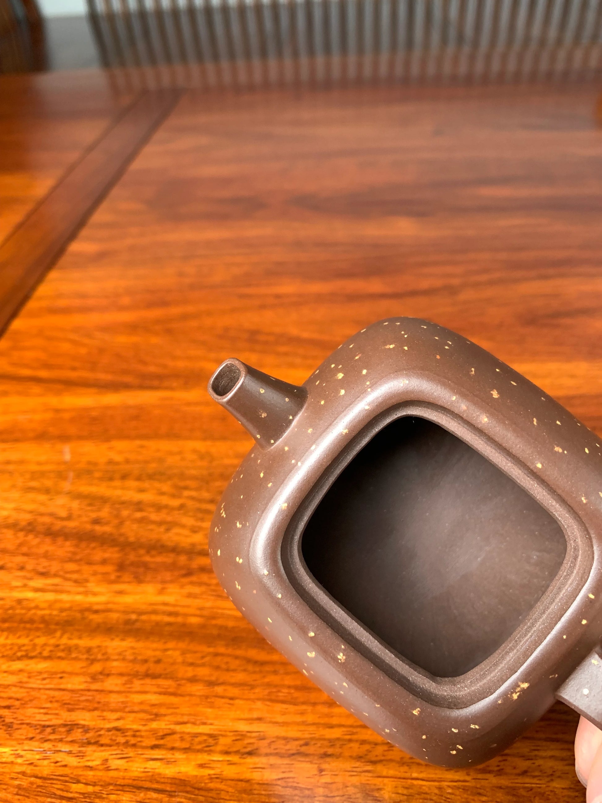 the spout and mouth of the zisha teapot