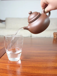 the perfect pour of the zisha teapot rong tian