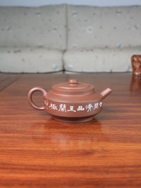 Back of the expensive teapot artwork