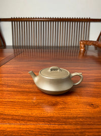 teapot artwork named ru yi on the table