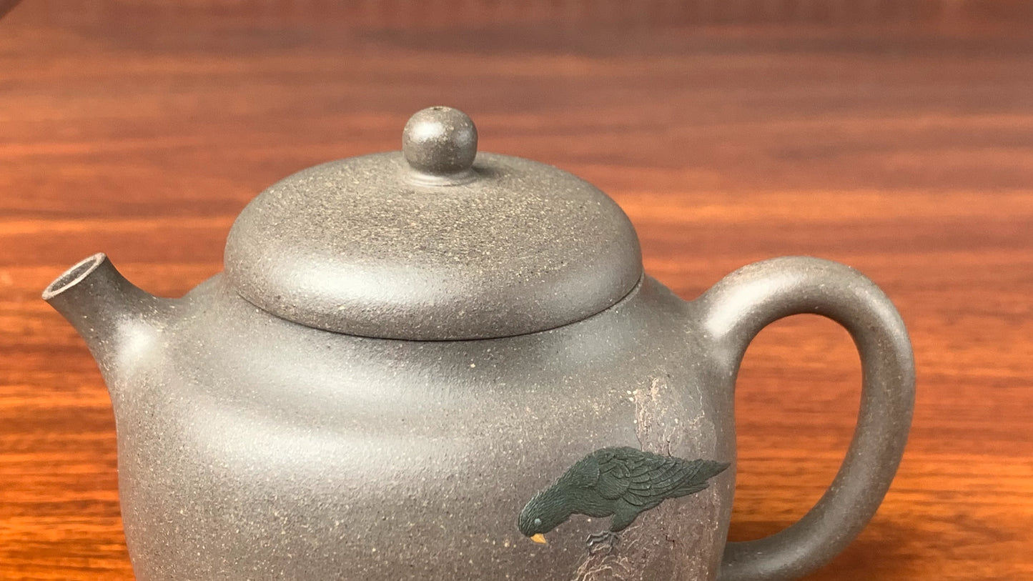 the detail of the teapot artwork from zisha art gallery