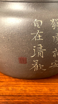 detail of the calligraphy on teapot artwork