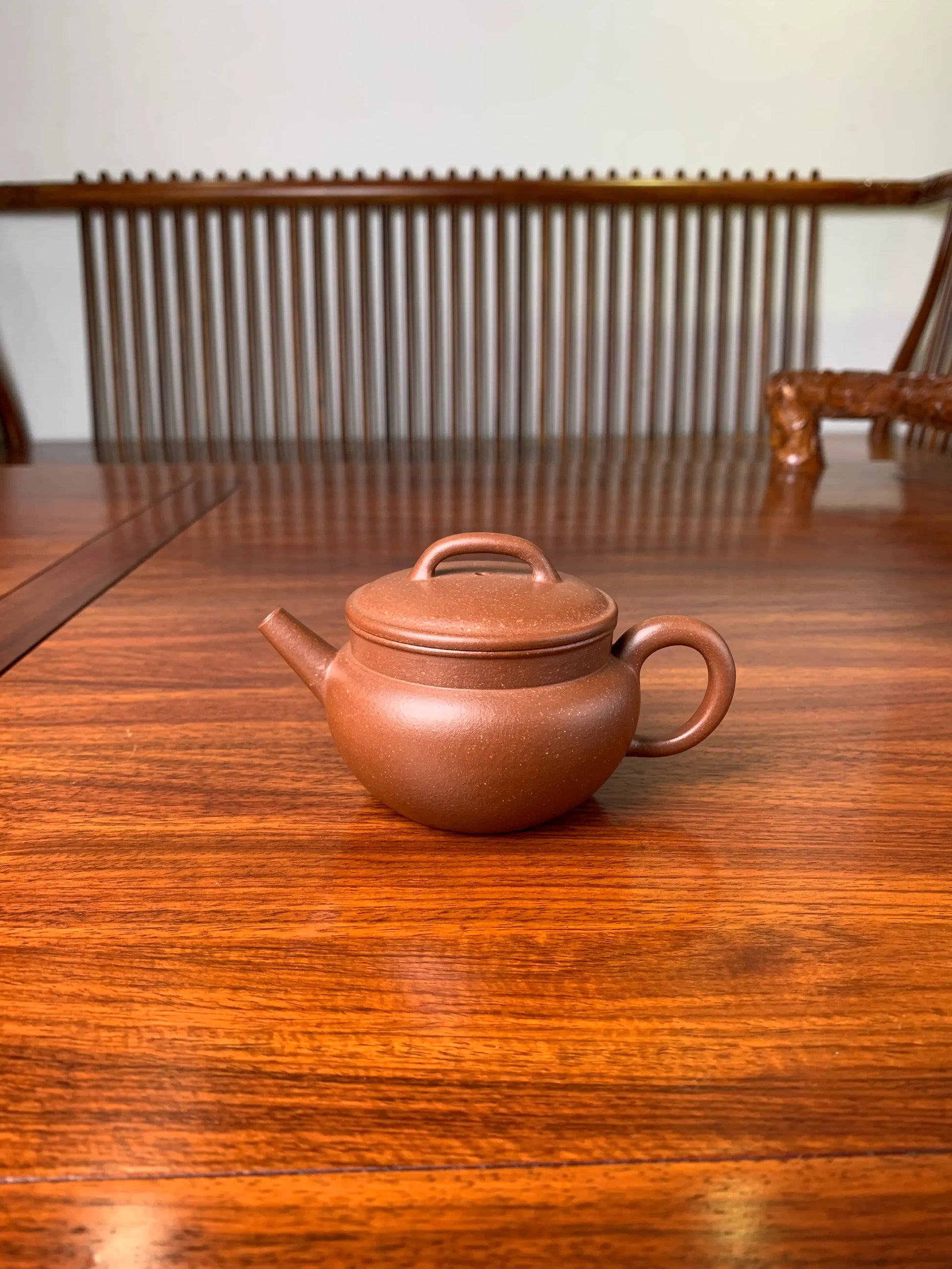 teapot artwork named fu on the table