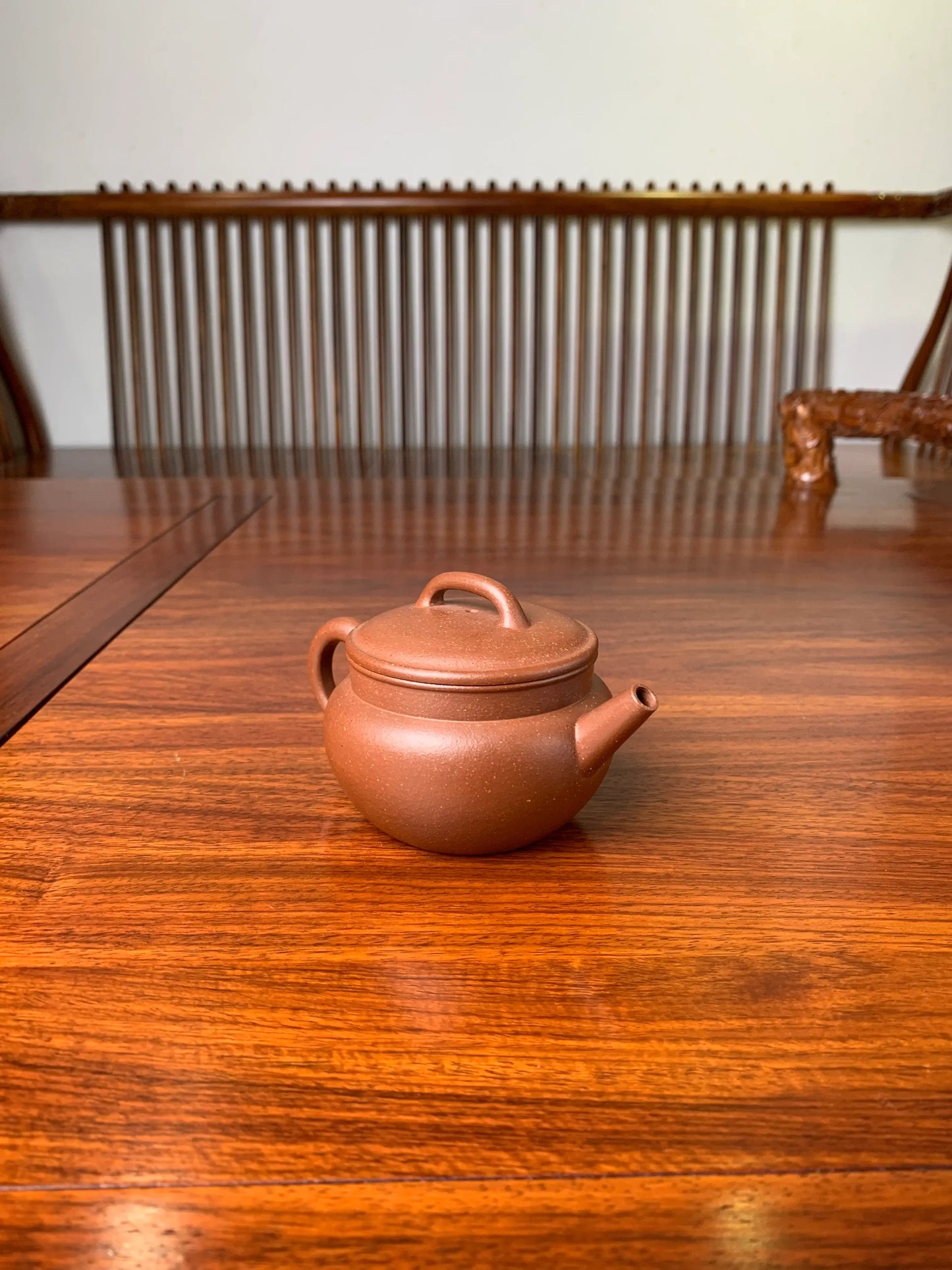 the teapot artwork named fu on the table left view