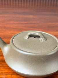 the lid and the mouth of the teapot artwork ru yi