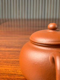 the detail of the yi shing teapot