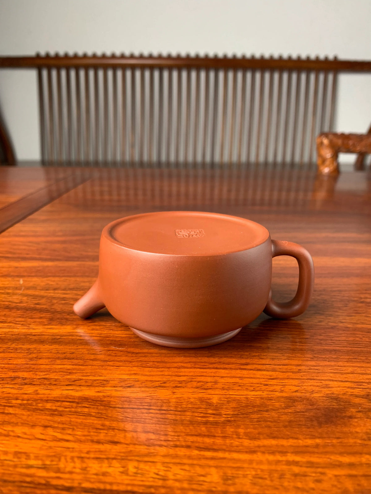 collectible teapot de zhong placed upside down on the table