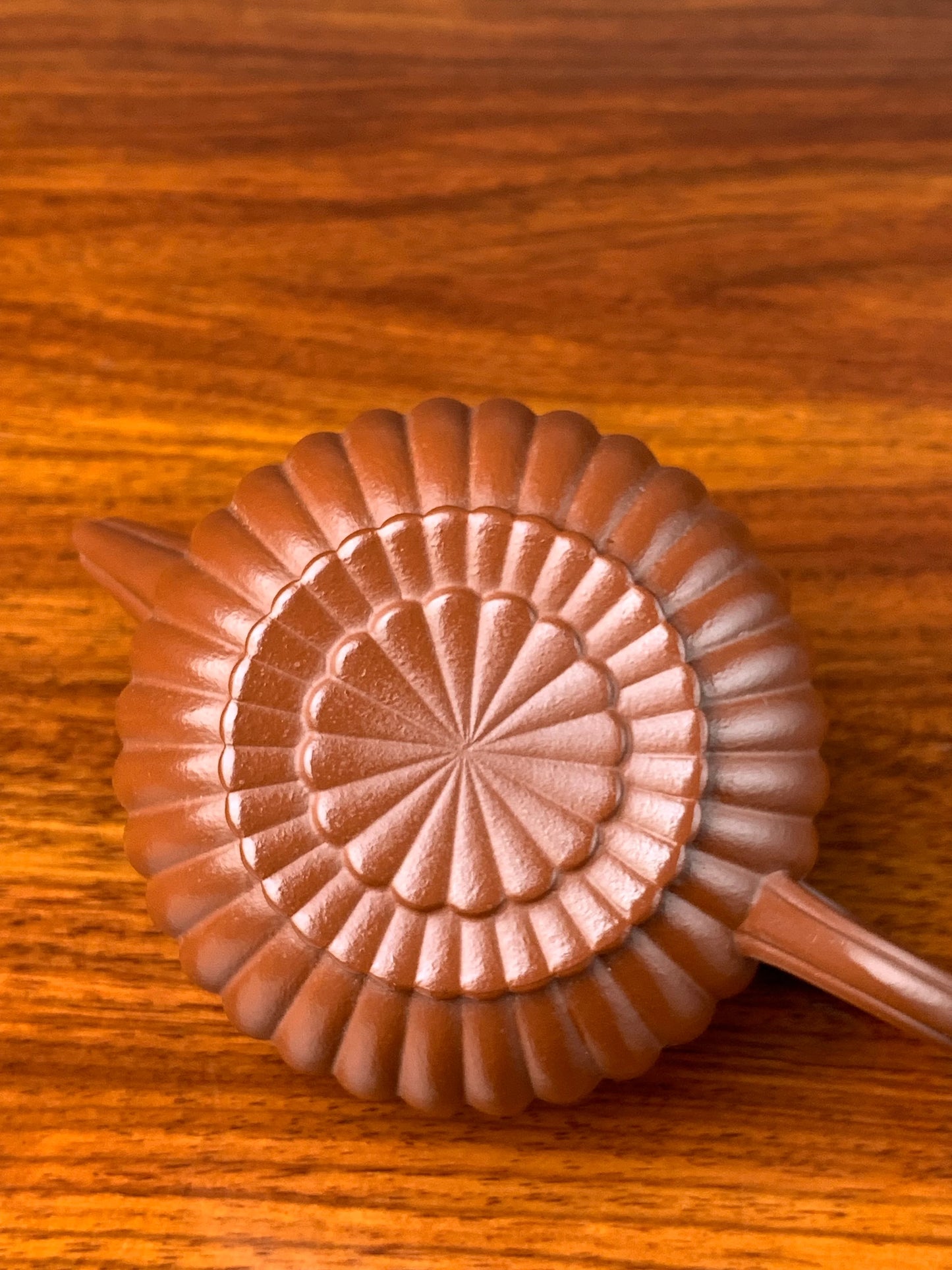Take a close look at the graceful lines on the bottom of this Yixing teapot.
