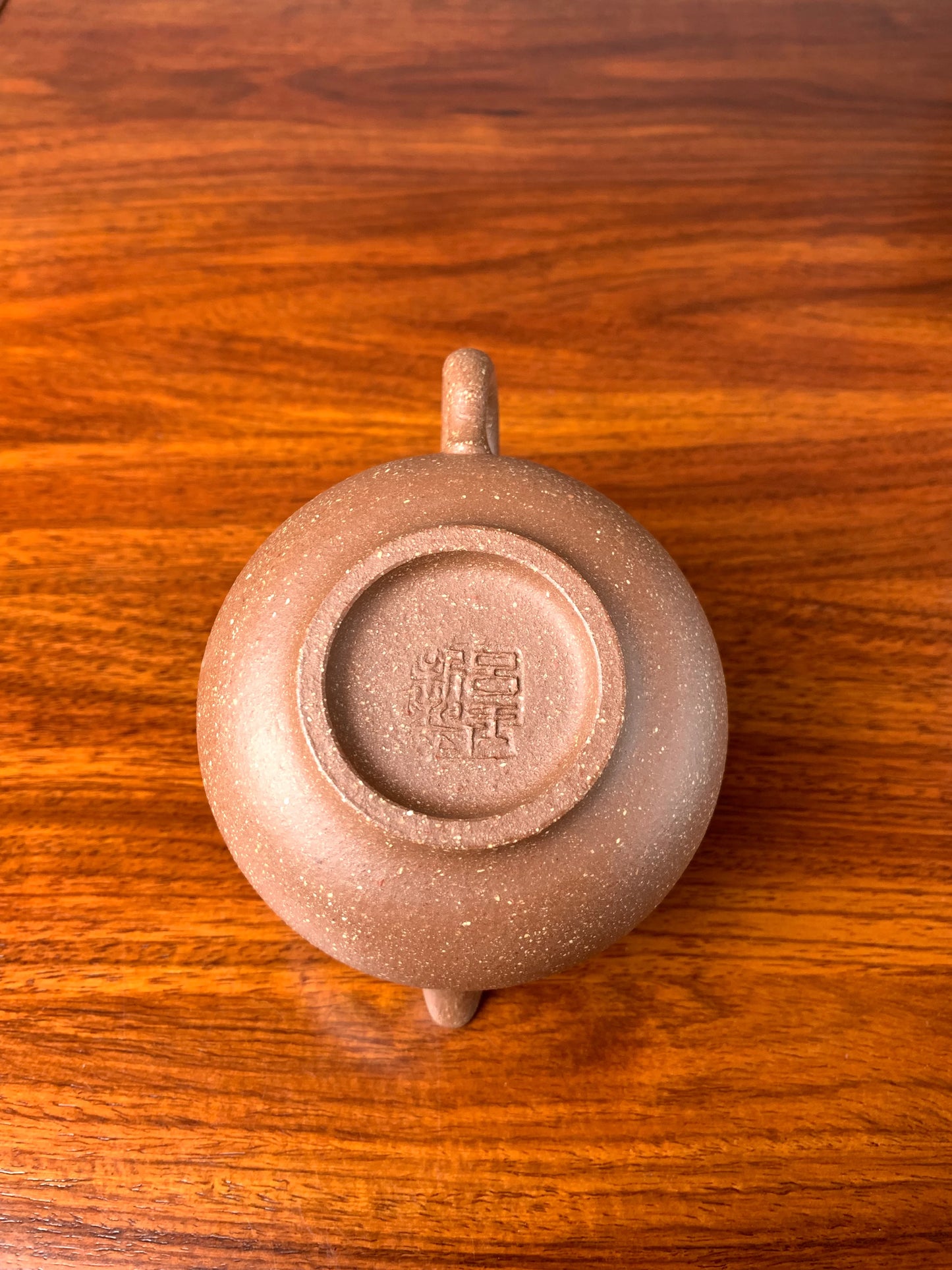 Looking down at the bottom of the zisha teapot