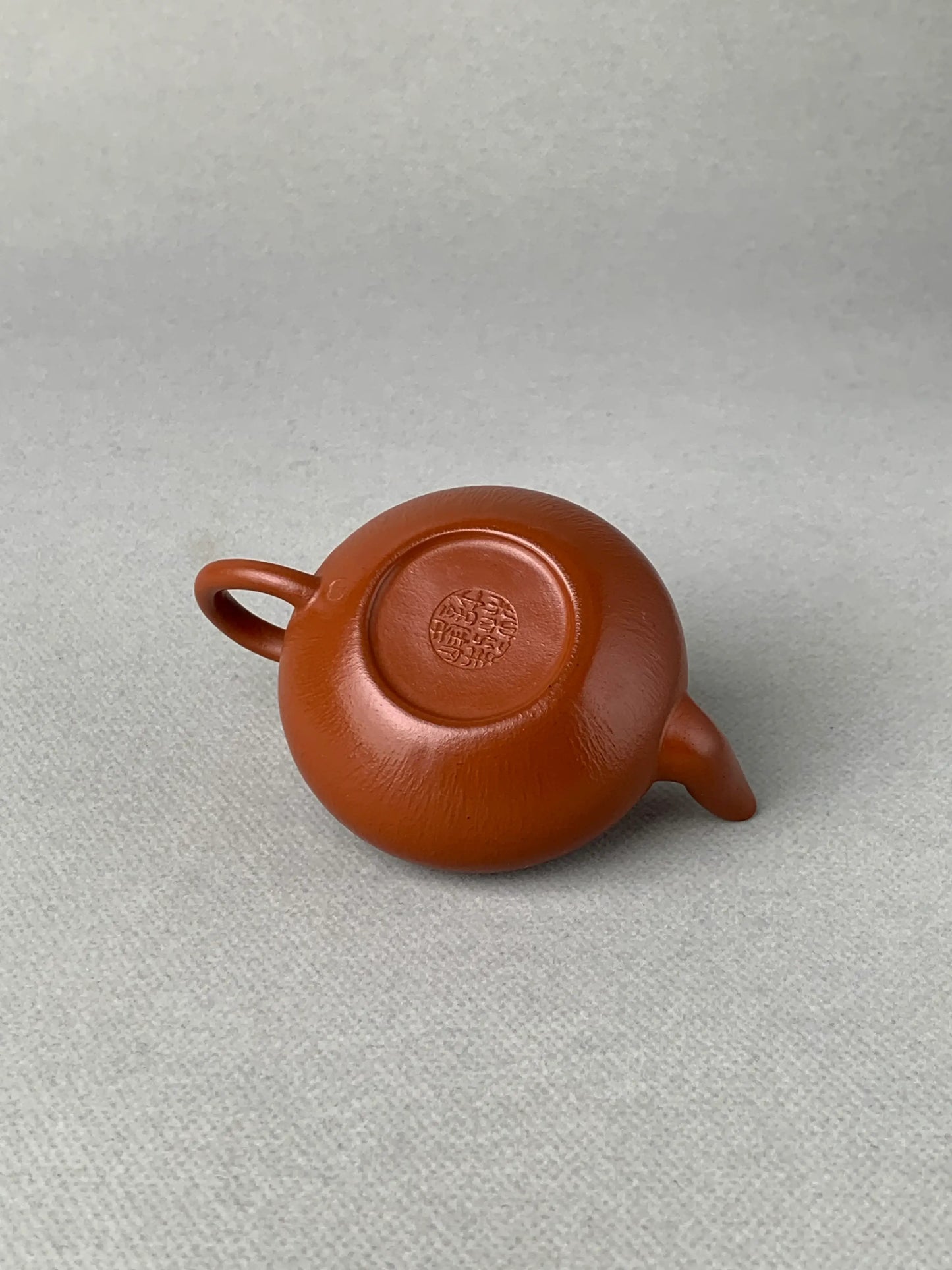 There is a seal on the bottom of the teapot