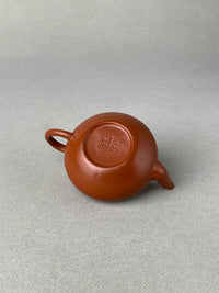 There is a seal on the bottom of the teapot
