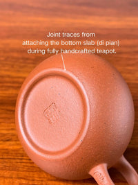 oint traces from attaching the bottom slab (di pian) during fully handcrafted teapot