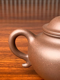 the detail of the teapot handle