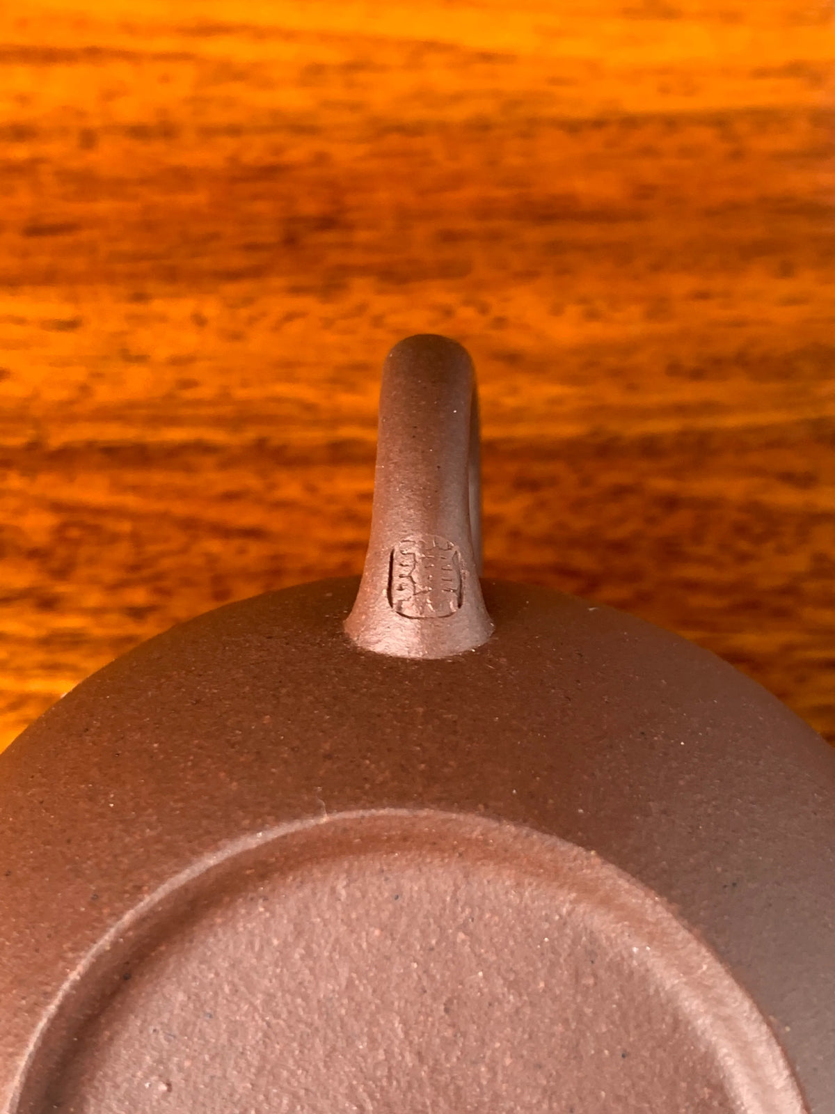 the teapot mark chen on the handle